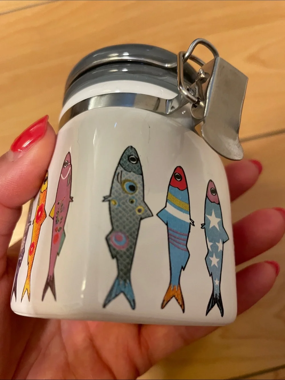 White Ceramic Fish Treat Jar with Colorful Fish Design
